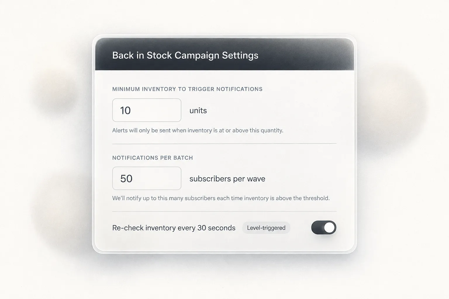 Back in Stock campaign settings showing minimum inventory threshold and batch controls